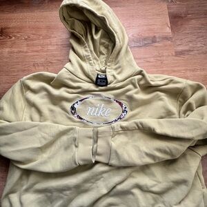 Nike Pastel Yellow Hoodie with Floral Oval Logo